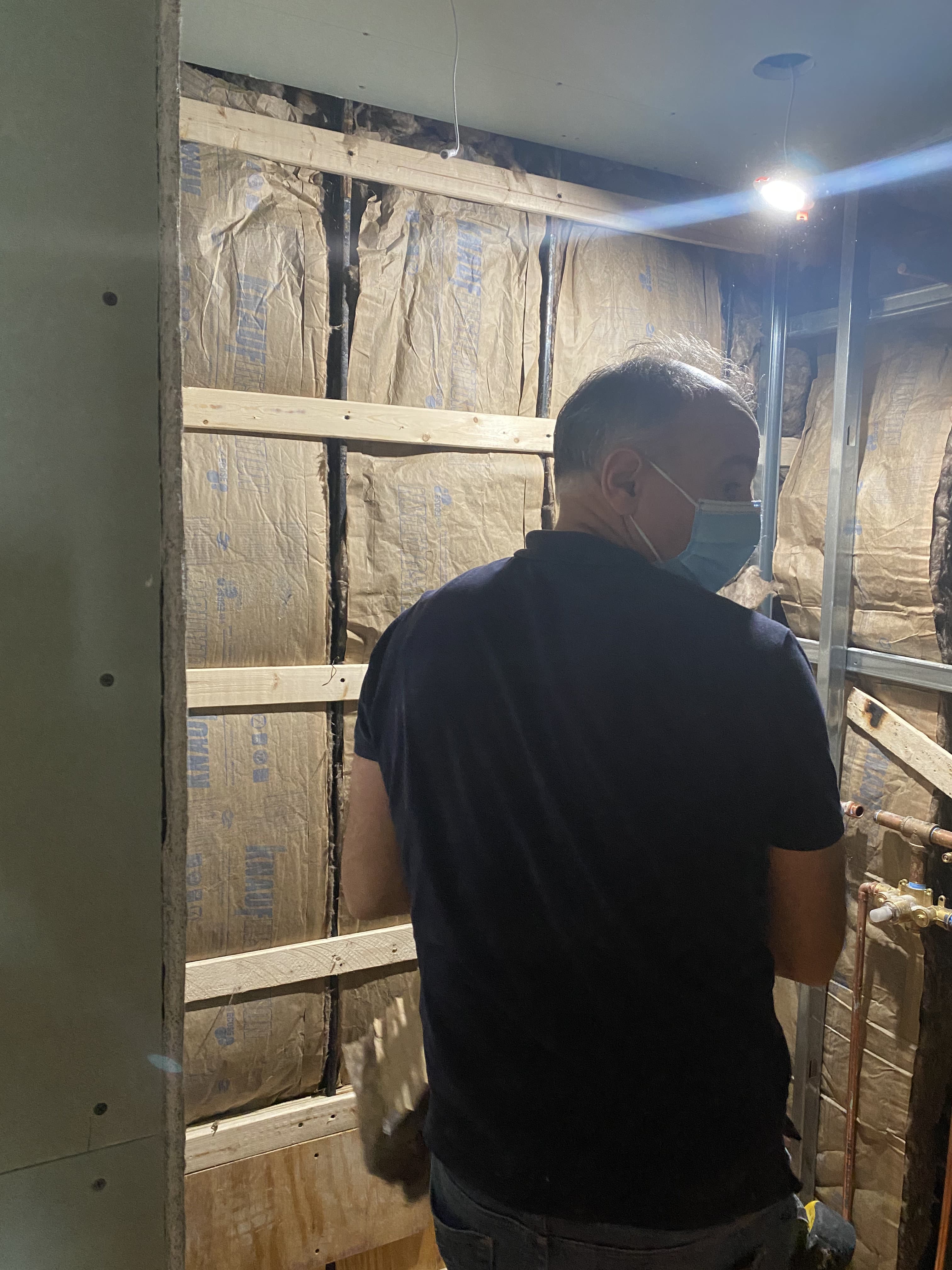 Interior renovation showing drywall finishing and ceiling detail