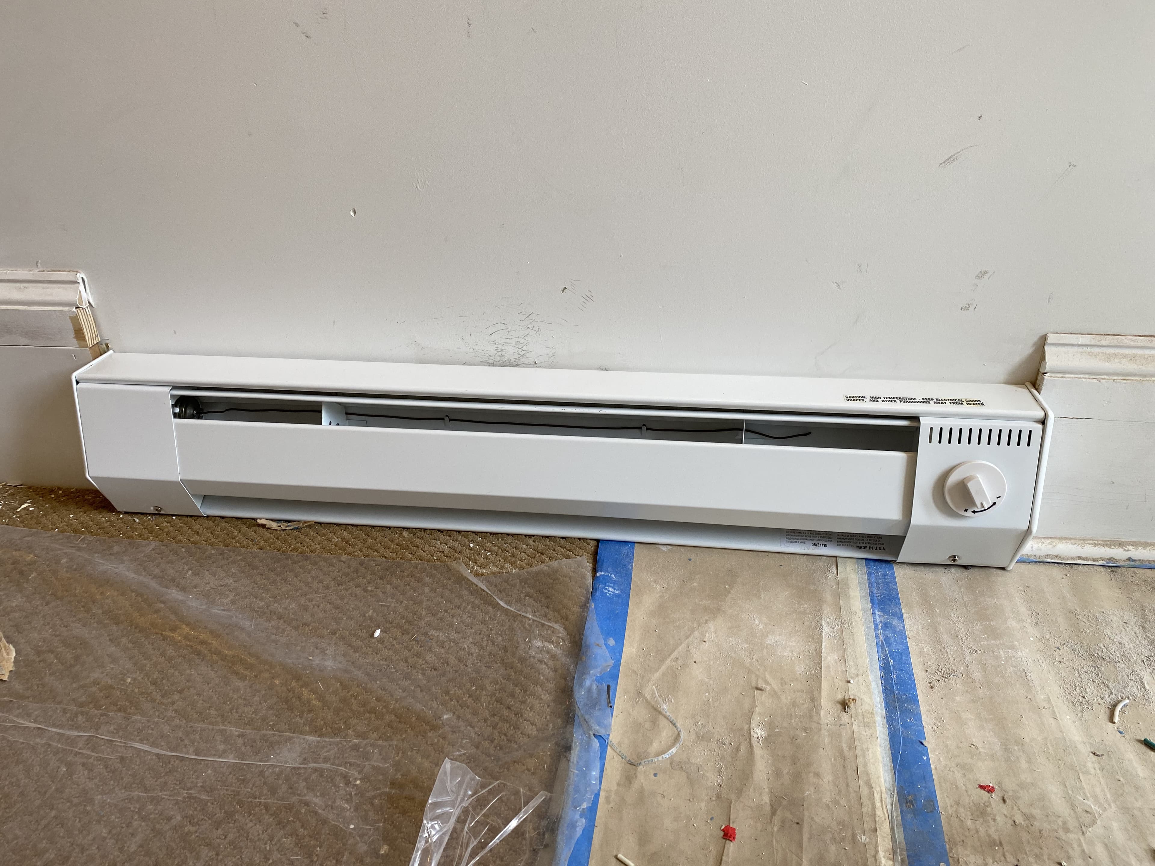 Wall repair and finishing detail during apartment gut renovation